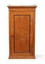 AN EARLY 19TH CENTURY OAK TABLE CABINET