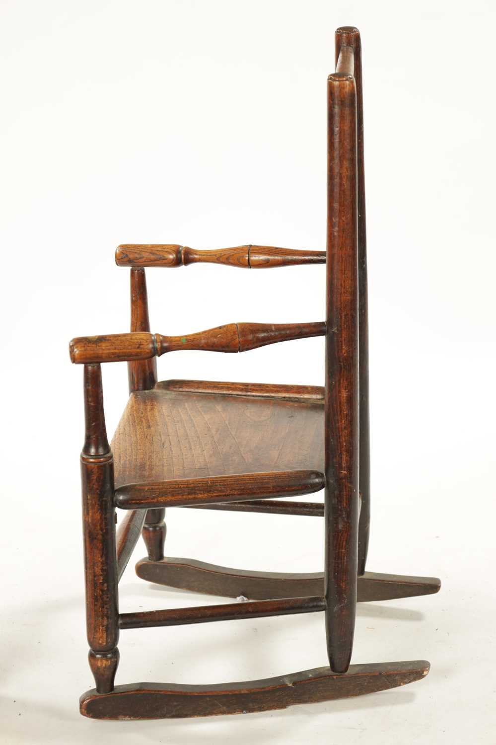 A 19TH CENTURY ELM CHILD'S SPINDLE BACK ROCKING CHAIR - Image 6 of 8