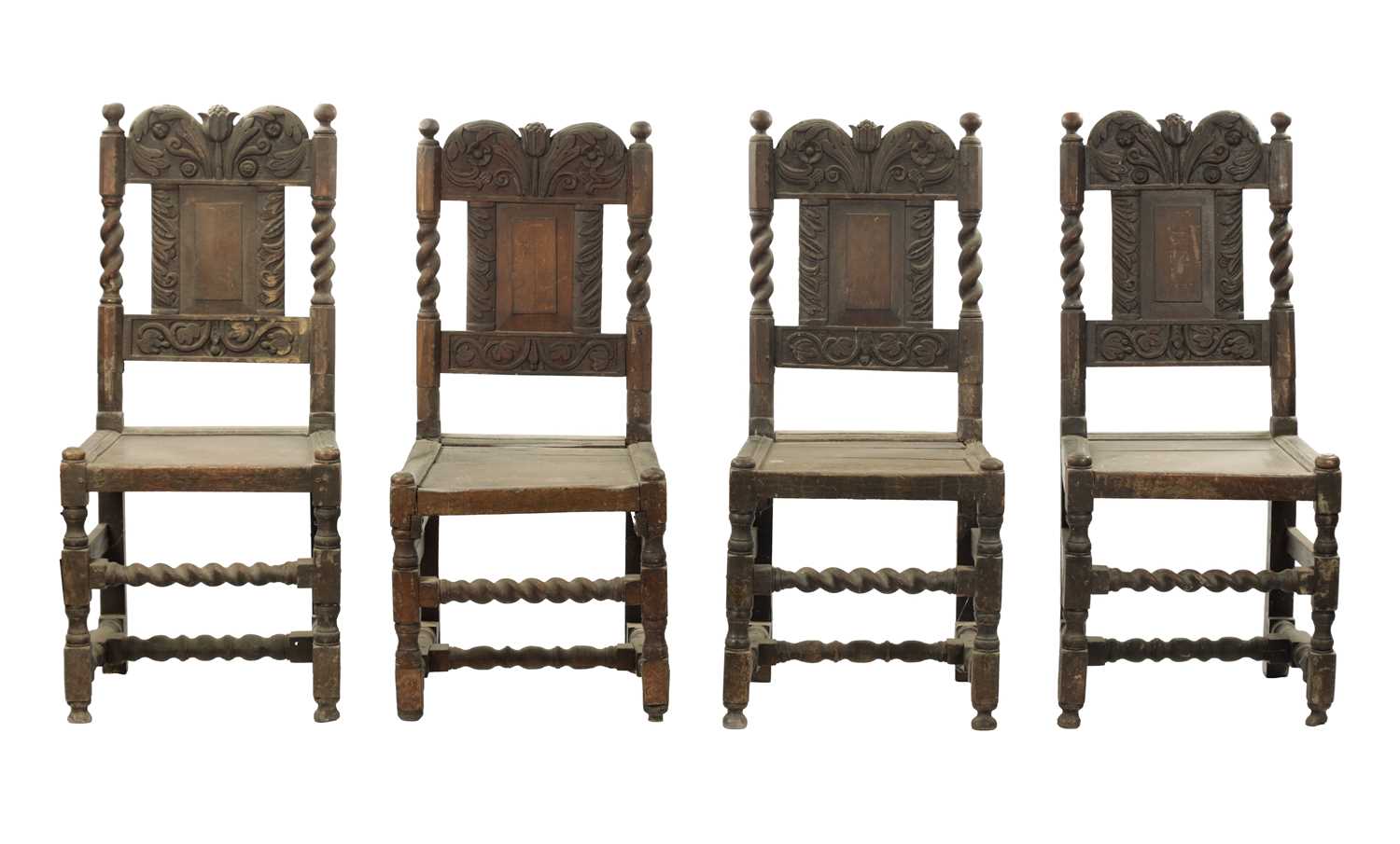 A RARE SET OF FOUR 17TH CENTURY CARVED OAK SIDE CHAIRS