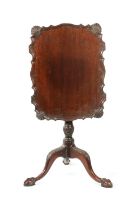 A 19TH CENTURY MAHOGANY TRIPOD TABLE IN THE GEORGE II STYLE