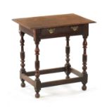 A SMALL 17TH CENTURY OAK SIDE TABLE