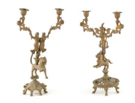 A PAIR OF 19TH CENTURY GILT BRASS INDIAN CANDELABRA