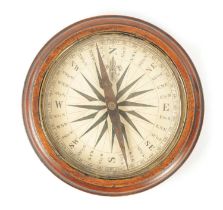 AN OVERSIZED GEORGE III MAHOGANY COMPASS