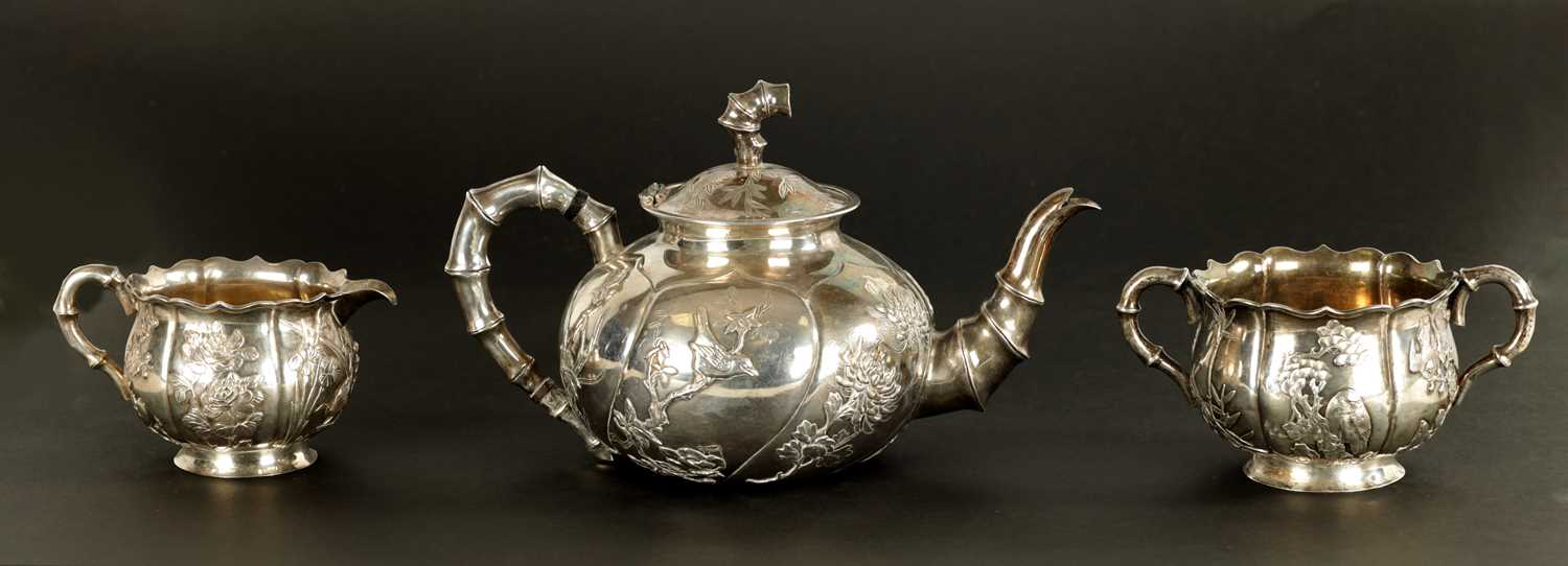 A LATE 19TH CENTURY CHINESE SILVER THREE-PIECE TEA SET