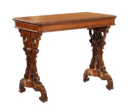 A 19TH CENTURY CARVED AND INLAID OAK LIBRARY TABLE BY LAMB MANCHESTER