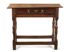 A LATE 17TH CENTURY ELM SIDE TABLE
