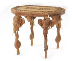 A 19TH CENTURY CARVED HARDWOOD INDIAN OCCASIONAL TABLE