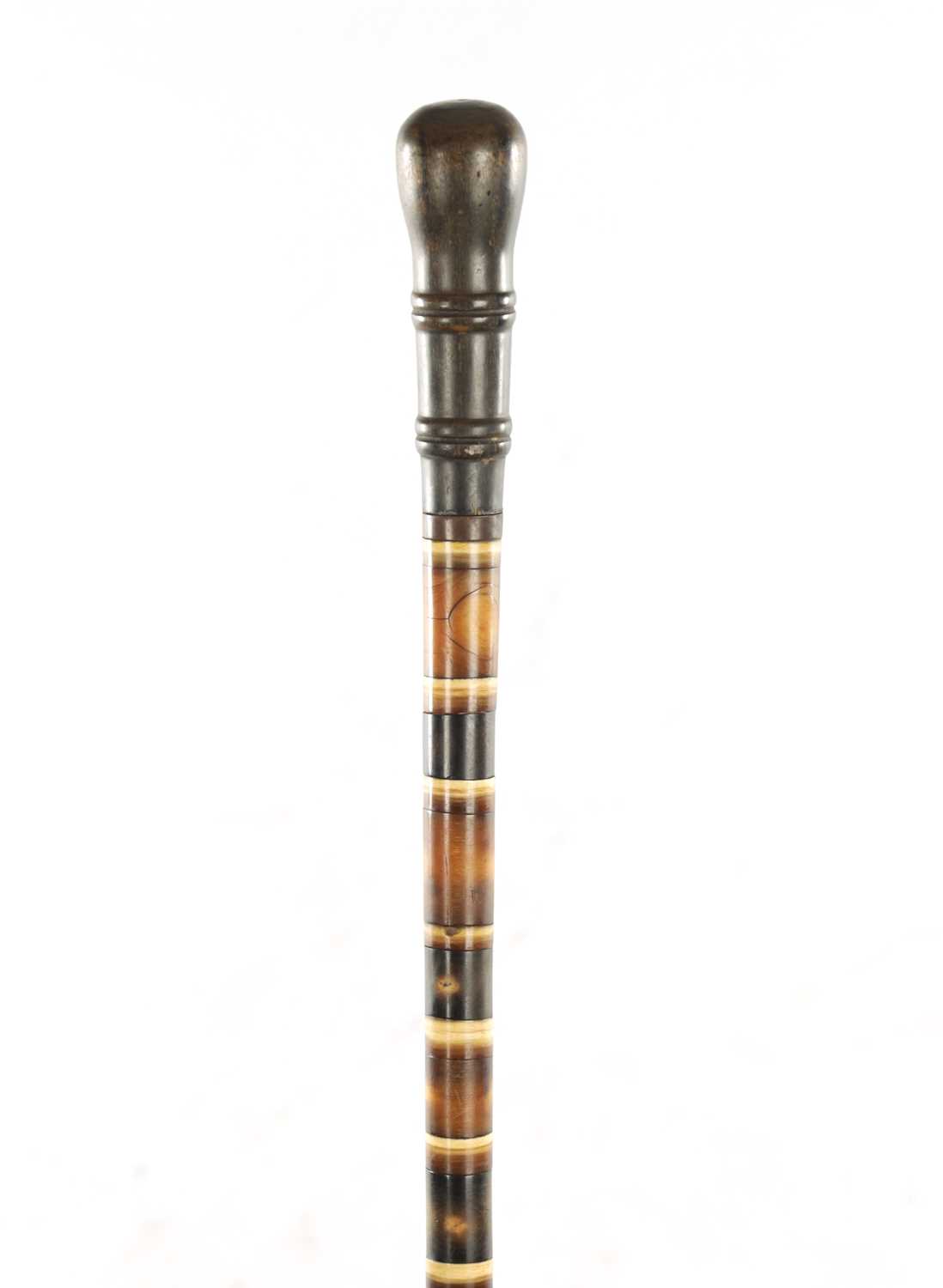 A LATE 19TH CENTURY SEGMENTED HORN AND BONE WALKING STICK