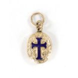 A VICTORIAN 9CT GOLD AND ENAMEL MOURNING PENDANT