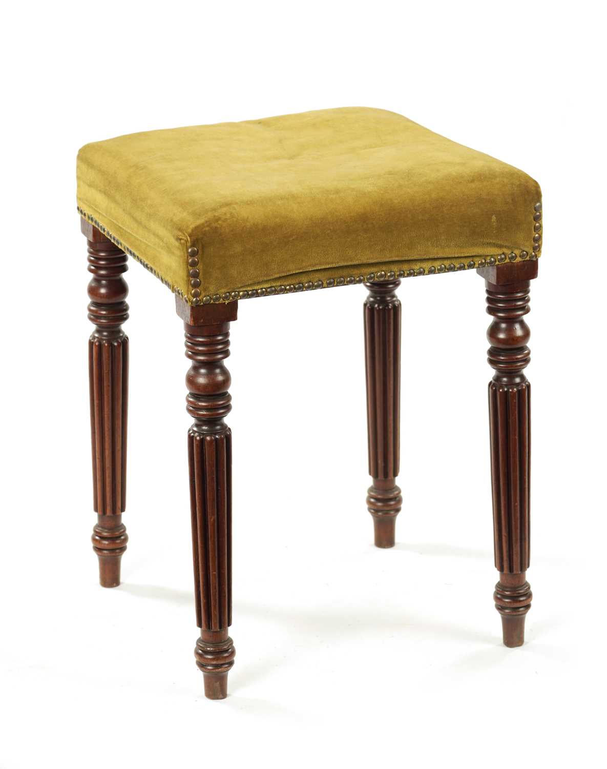 A WILLIAM IV MAHOGANY UPHOLSTERED STOOL IN THE MANNER OF GILLOWS