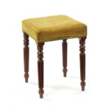 A WILLIAM IV MAHOGANY UPHOLSTERED STOOL IN THE MANNER OF GILLOWS