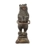 A LATE 19TH CENTURY CARVED BLACK FOREST BEAR STICK STAND