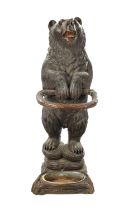 A LATE 19TH CENTURY CARVED BLACK FOREST BEAR STICK STAND