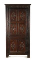 A RARE LATE 17TH CENTURY JOINED OAK WESTMORLAND TALL TWO DOOR SIDE CABINET