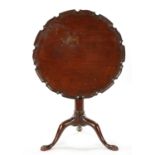 A GEORGE III MAHOGANY PIE CRUST EDGE BIRD CAGE CHIPPENDALE-STYLE TRIPOD TABLE