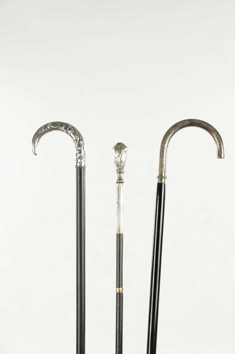 A COLLECTION OF THREE ART NOUVEAU SILVER TOPPED WALKING STICKS - Image 5 of 13