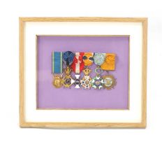 A FRAMED GROUP OF SIX WW2 OFFICERS GROUP OF MEDALS