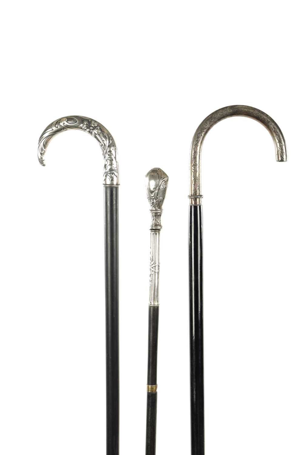 A COLLECTION OF THREE ART NOUVEAU SILVER TOPPED WALKING STICKS