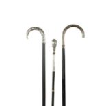 A COLLECTION OF THREE ART NOUVEAU SILVER TOPPED WALKING STICKS