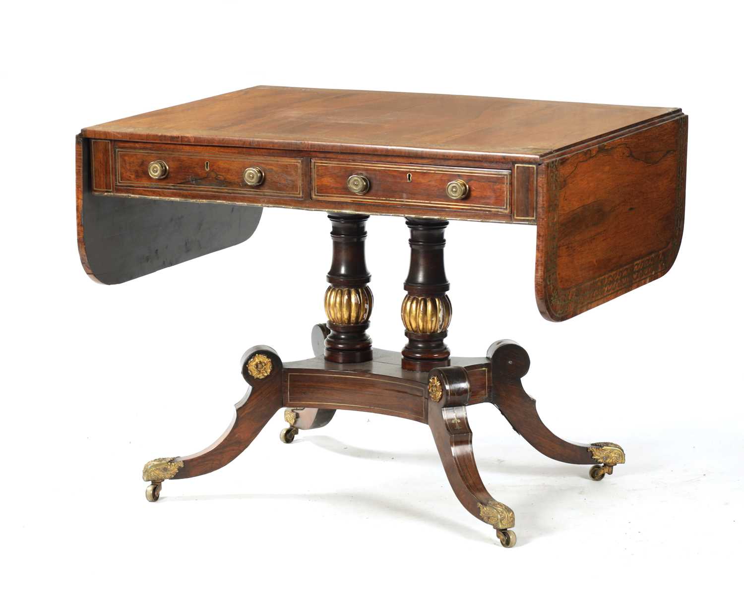A REGENCY FIGURED ROSEWOOD BRASS INLAID SOFA TABLE
