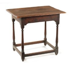 AN EARLY 18TH CENTURY OAK AND ELM RECTANGULAR TABLE