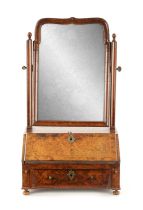 A FINE QUEEN ANNE HERRINGBONE BANDED AND BURR WALNUT TABLE MIRROR