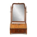 A FINE QUEEN ANNE HERRINGBONE BANDED AND BURR WALNUT TABLE MIRROR