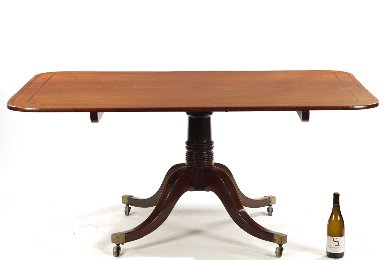 A GOOD REGENCY MAHOGANY AND EBONY INLAID PEDESTAL DINING TABLE OF LARGE SIZE - Image 2 of 9