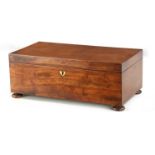 A 19TH CENTURY FIGURED MAHOGANY TEA CADDY WITH FIVE LIDDED INTERNAL COMPARTMENTS