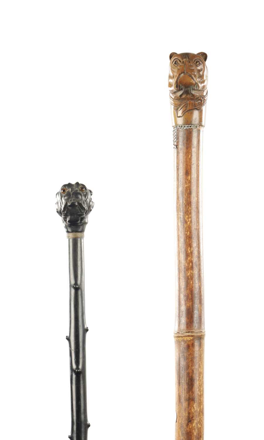 TWO 19TH CENTURY CARVED DOG WALKING CANES