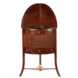 AN UNUSUAL GEORGE III MAHOGANY CORNER WASH STAND