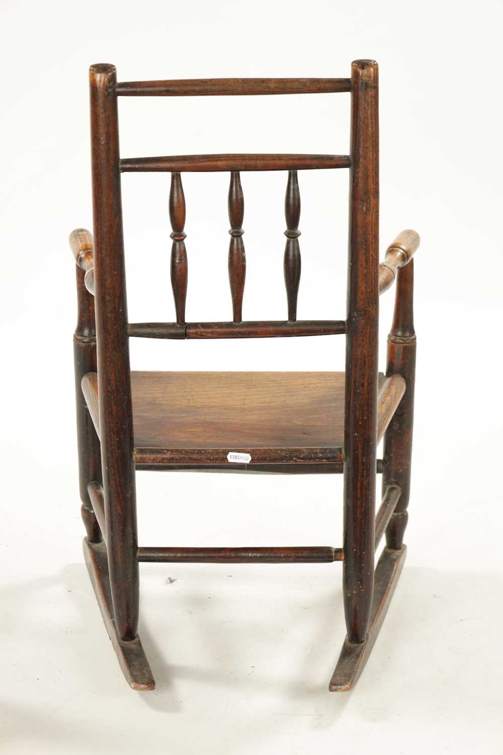 A 19TH CENTURY ELM CHILD'S SPINDLE BACK ROCKING CHAIR - Image 7 of 8