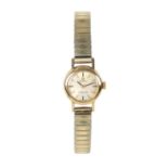 AN OMEGA LADYMATIC 9CT GOLD AUTOMATIC LADY'S WRISTWATCH