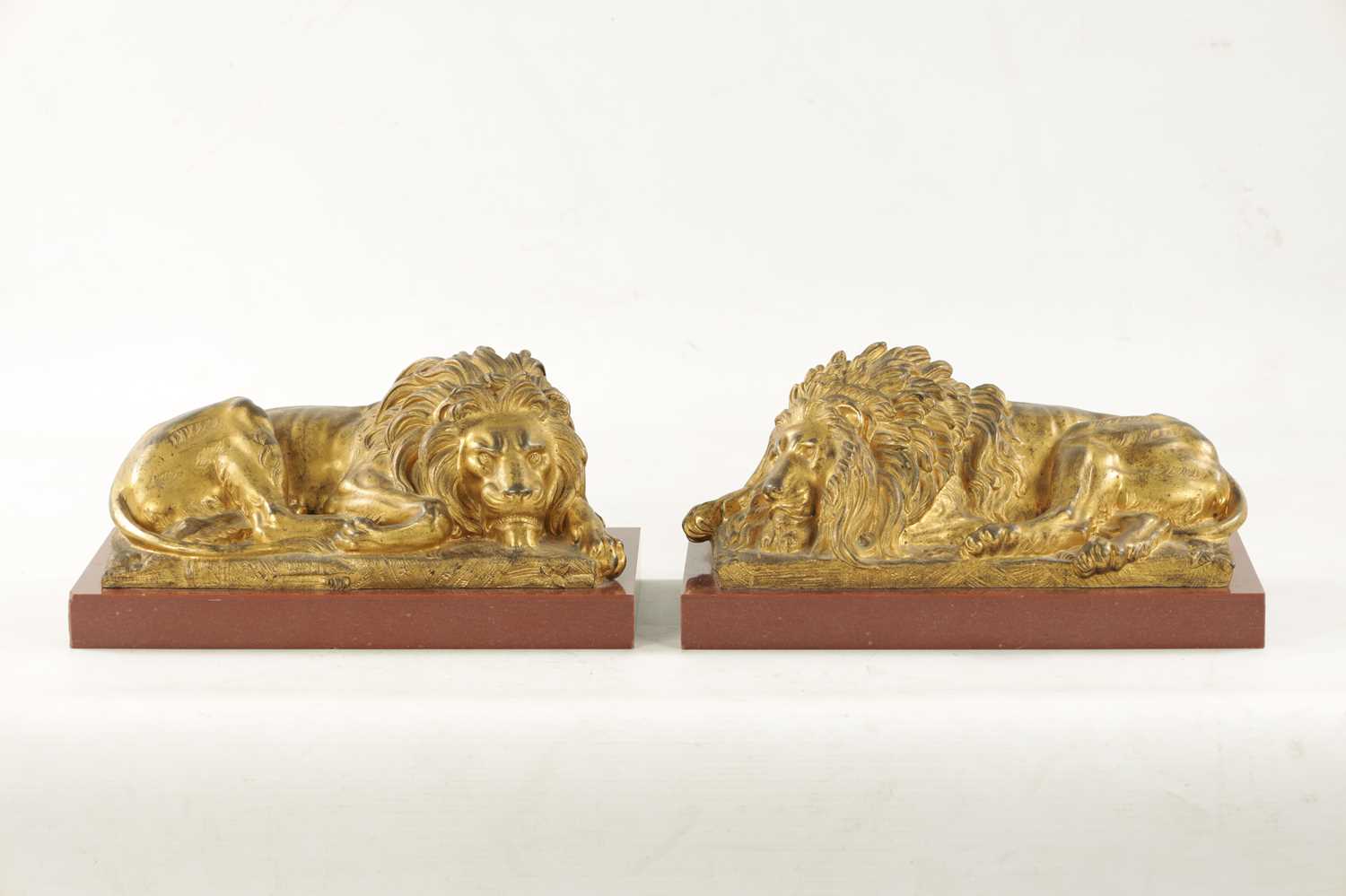 A PAIR OF LATE 19TH CENTURY GILT BRONZE RECUMBENT LIONS - Image 3 of 11