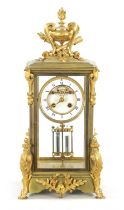 A LATE 19TH CENTURY FRENCH GILT BRASS FOUR-GLASS MANTEL CLOCK