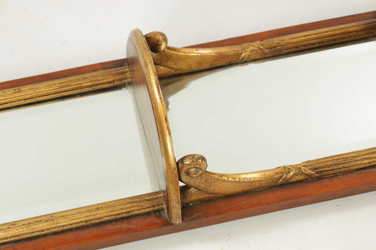 A PAIR OF REPRODUCTION GEORGE II STYLE PARCEL GILT AND WALNUT HANGING MIRRORS - Image 5 of 5