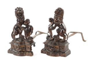 A PAIR OF 19TH CENTURY BRONZE SCULPTURED CHENETS