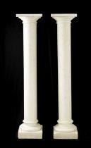 A LARGE PAIR OF WHITE MARBLE COLUMNS