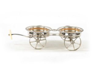 A 19TH CENTURY NOVELTY SILVER PLATED TABLE TOP DOUBLE COASTER TROLLEY FORMED AS A CARRIAGE