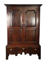 AN EARLY 18TH CENTURY JOINED OAK WELSH CUPBOARD