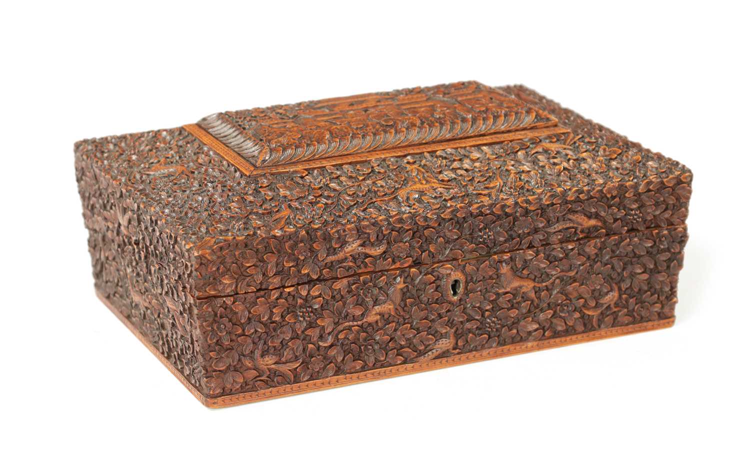 A 19TH CENTURY INDIAN CARVED HARDWOOD SEWING BOX