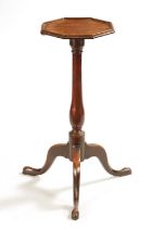 A GEORGE III MAHOGANY OCTAGONAL TOP KETTLE STAND