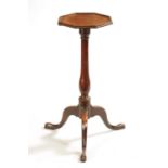 A GEORGE III MAHOGANY OCTAGONAL TOP KETTLE STAND