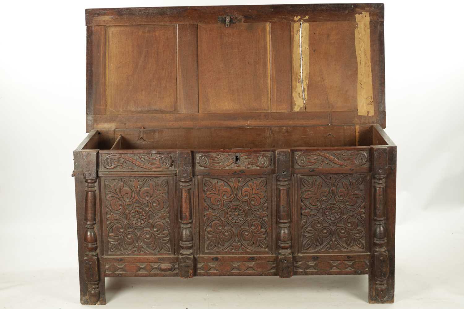 A 17TH CENTURY CARVED OAK THREE PANELLED FRONT COFFER - Image 5 of 8