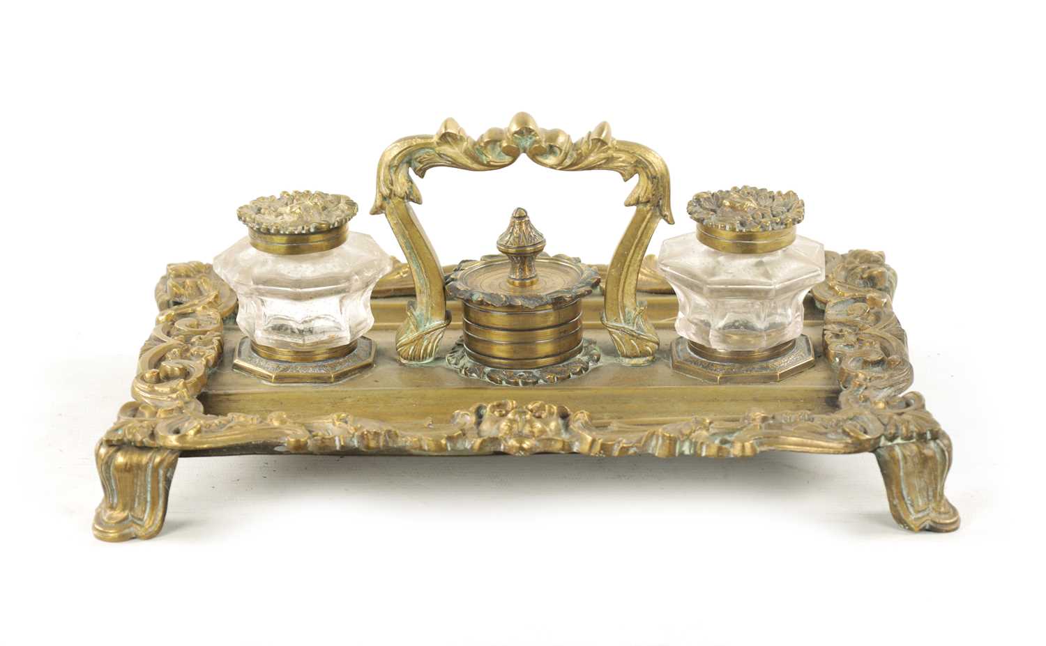 A 19TH CENTURY BRASS ROCOCO INK STAND