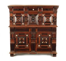 A 17TH CENTURY TWO PART MOULDED FRONT YEW-WOOD, WALNUT AND EBONY CHEST OF DRAWERS