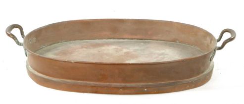 A 19TH CENTURY OVAL COPPER FISH KETTLE LID