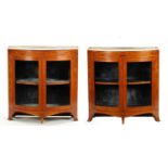 A FINE PAIR OF GEORGE III INLAID SATINWOOD BOW-FRONT SIDE CABINETS IN THE MANNER OF MOORE OF DUBLIN