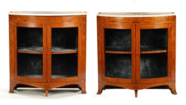 A FINE PAIR OF GEORGE III INLAID SATINWOOD BOW-FRONT SIDE CABINETS IN THE MANNER OF MOORE OF DUBLIN