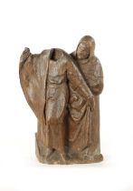 A 17TH CENTURY CARVED OAK FIGURAL SCULPTURE 'THE MURDER OF THOMAS BECKETT'